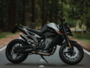 black-and-silver-naked-motorcycle-on-road-during-daytime.jpg black and silver naked motorcycle on road during daytime