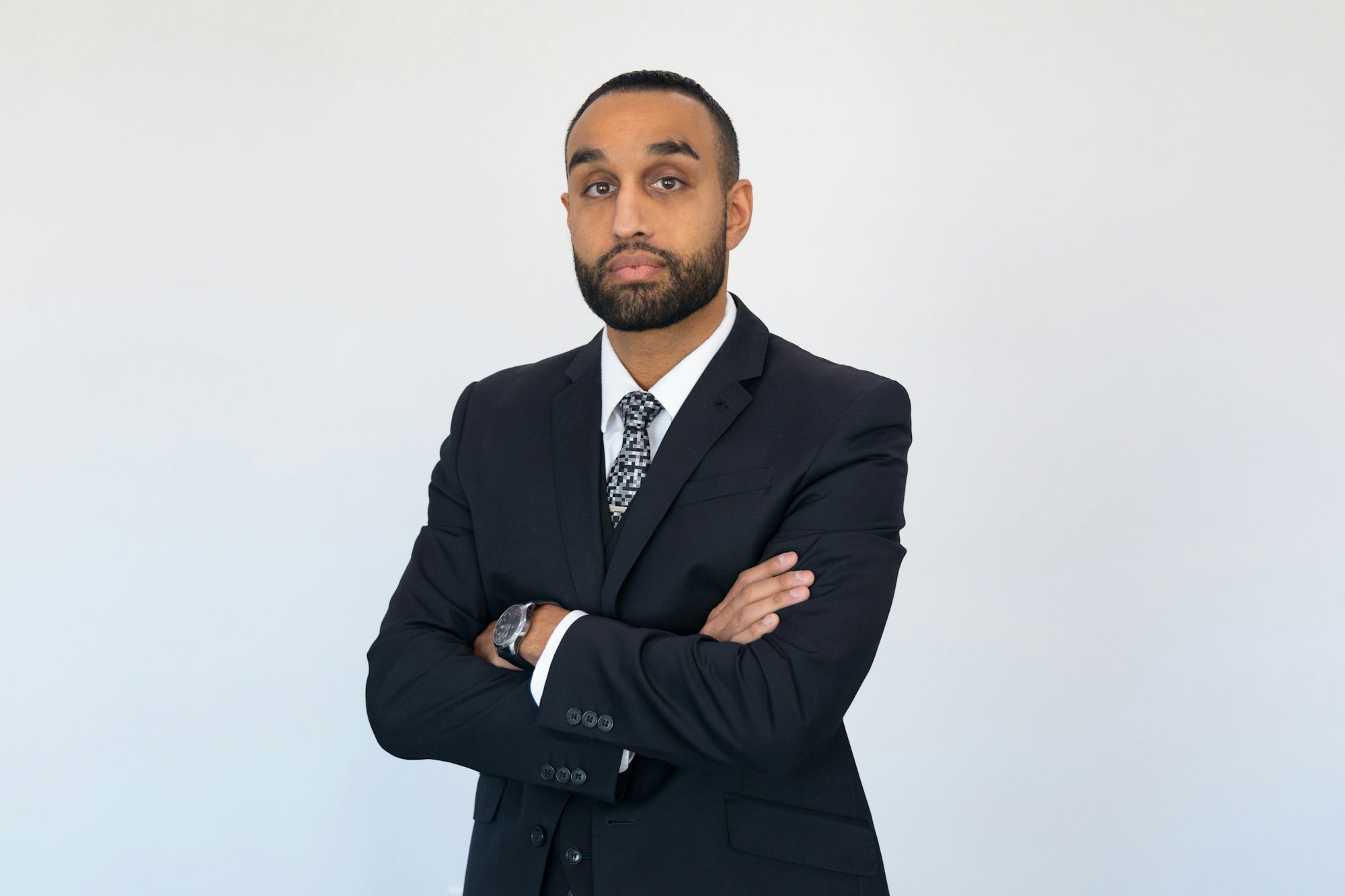 a-man-with-his-arms-crossed.jpg a man with his arms crossed